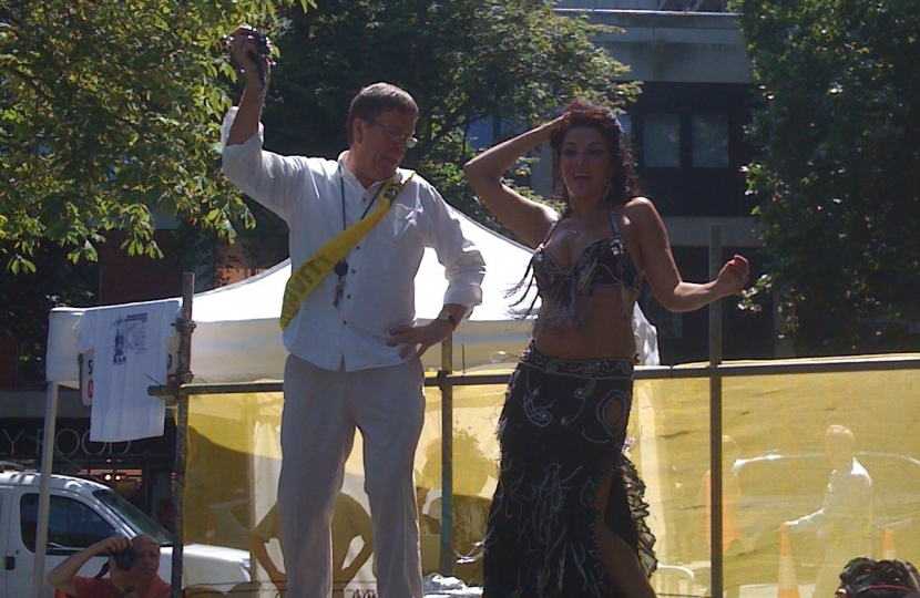 Cllr Chris Knight belly dancing at the South End Green Festival