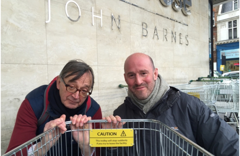 Cllr Roger Freeman and Cllr Simon Marcus rescue a stray Waitrose trolley