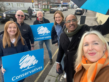 Julie Redmond and Don Williams & team talking with residents in Gospel Oak